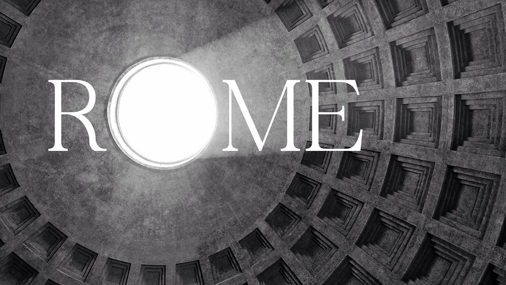 The Pantheon, Rome: A domed interior with a circular oculus above a monumental floor and walls.